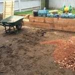 Preparing the ground for the patio